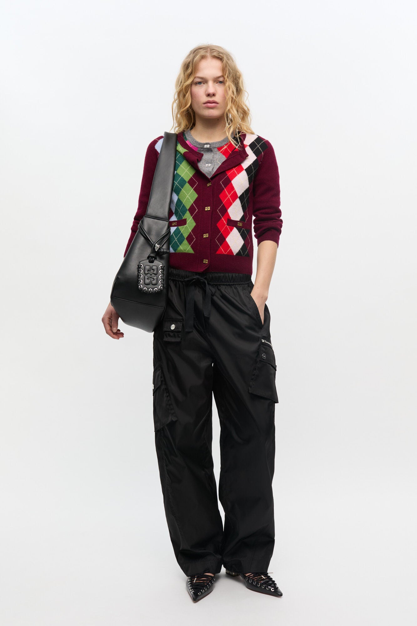 Burgunderrote Strickjacke mit Karomuster